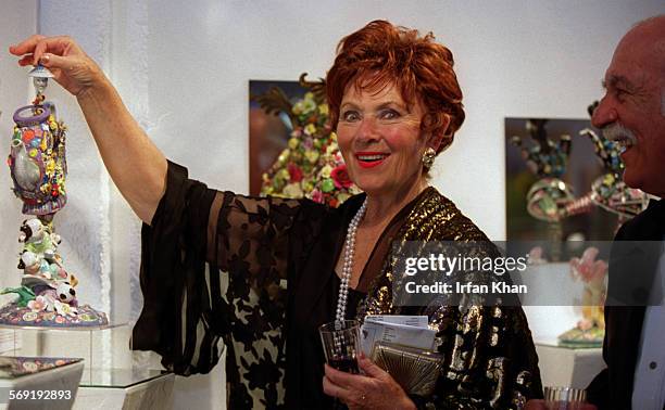 Marion Ross, left, and her husband Paul Michael admiring an exhibit at Pageant of the Masters held in Laguna Beach on Friday evening.