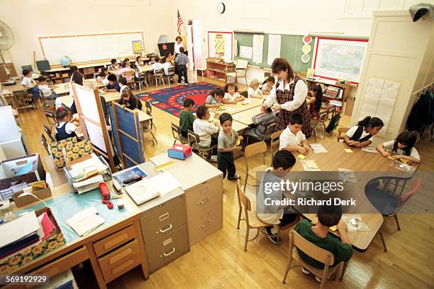 Back#3.0905 .rd.9596 Reseda Elementary School: where new 1st grade teacher Jana Doros directs her first grade students after her class has joined...