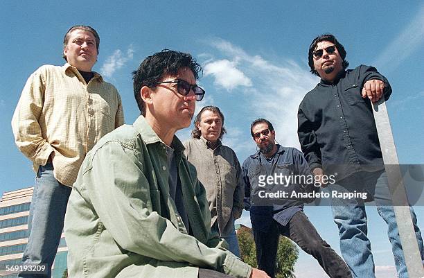 East LA rock band, Los Lobos are photographed for Los Angeles Times on March 1, 1996 at Warner Records in Burbank, California. Band members : David...