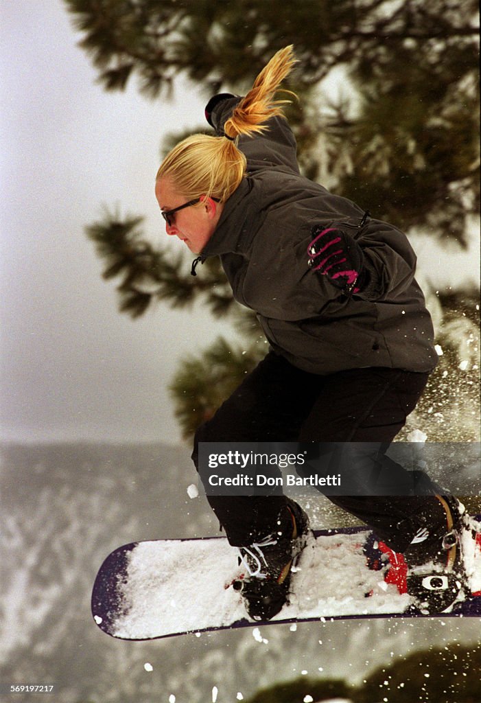 ME.Snow.Jump.DB.031699SanBernardino Amanda Linson 16, of Long Beach flys off a jump at Snow Vall
