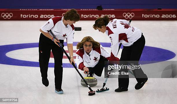 Shannon Kleibrink of Canada releases the stone during the bronze medal match of the women's curling between Norway and Canada during Day 13 of the...