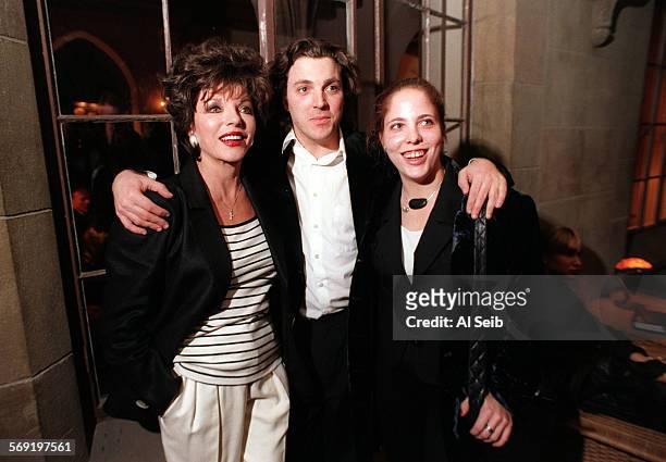 Newley.1.0130.AS.b Hollywood, CA. Sacha Newley with his famous mother Joan Collins and sister Katy Kass at a cocktail reception in the Chateau...