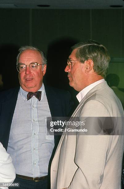 General Manager of the New York Islanders Bill Torrey and team coach Al Arbour talk together, June 1991.