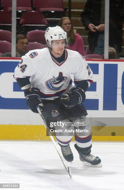 Matt Cooke of the Vancouver Canucks skates before the game against the New Jersey Devils at the Continental Airlines Arena on January 13, 2006 in...