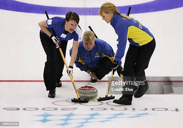 Catherine Lindahl, Anette Norberg and Anna Svaerd of Sweden in action during the gold medal match of the women's curling between Sweden and...