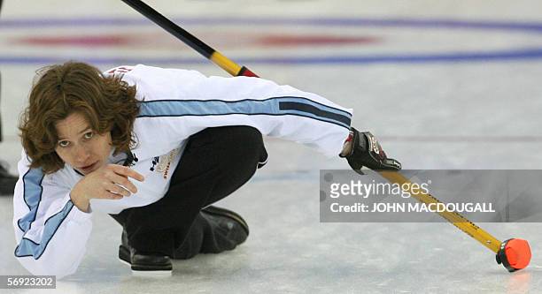 Switzerland's skip Mirjam Ott follows her last throw during the women's curling final at the 2006 Turin Winter Olympic Games, in Pinerolo 23 February...