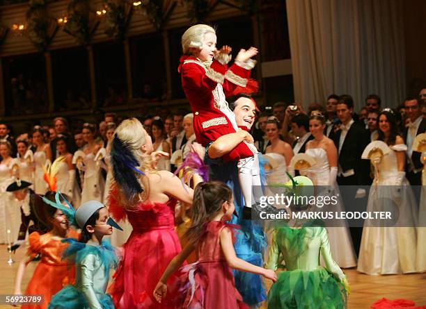 Dancers and a junior Amadeus Wolfgang Mozart inaugurate the annual Opera Ball in Vienna 23 February 2006.