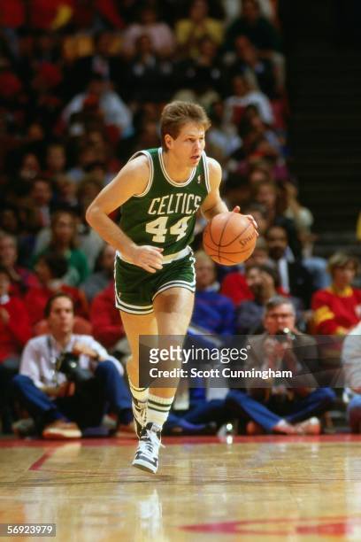 Danny Ainge of the Boston Celtics dribbles the ball upcourt against the Atlanta Hawks during an NBA game at the Omni circa 1986 in Atlanta, Georgia....