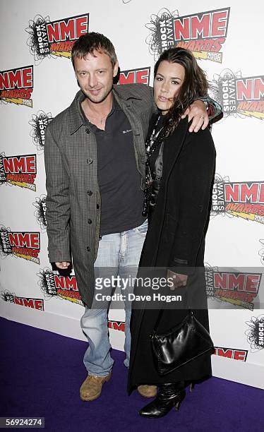 Actor John Simm and Kate Magowan arrive at the Shockwaves NME Awards 2006, the weekly music magazine's annual awards at which winners are decided by...