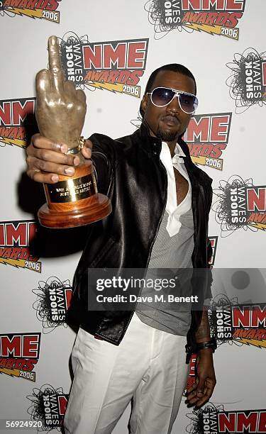 Kanye West poses in the Awards Room with the award for Best Solo Artist supported by E4 at the Shockwaves NME Awards 2006, the weekly music...