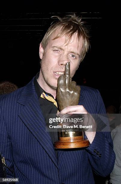 Actor Rhys Ifans poses with the award for Best Video on behalf of Oasis at the after show party following the Shockwaves NME Awards 2006, the weekly...