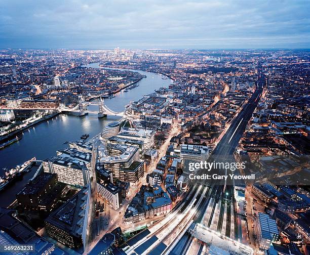 elevated view over the city of london at dusk - london aerial stock pictures, royalty-free photos & images