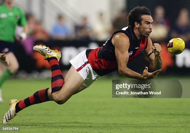 Scott Lucas of Essendon in action during the first round NAB Cup match between the Brisbane Lions and Essendon at Carrara Stadium on February 24,...