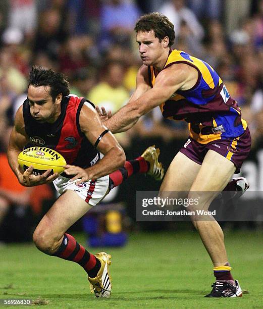 Scott Lucas of Essendon takes a mark during the first round NAB Cup match between the Brisbane Lions and Essendon at Carrara Stadium on February 24,...