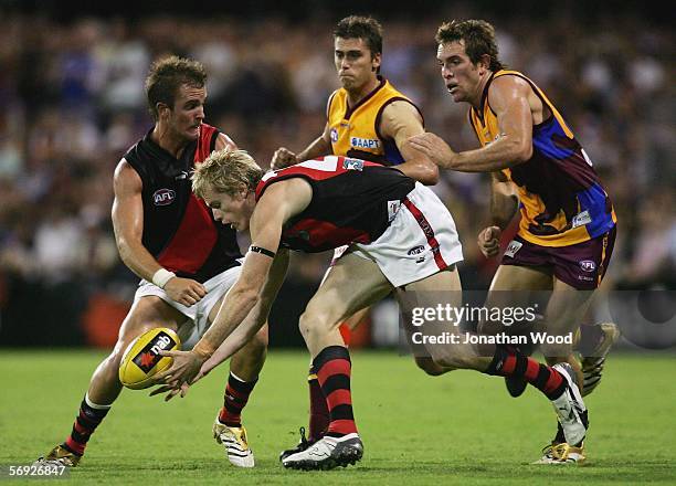 Joel Reynolds of Essendon wins the ball during the first round NAB Cup match between the Brisbane Lions and Essendon at Carrara Stadium on February...