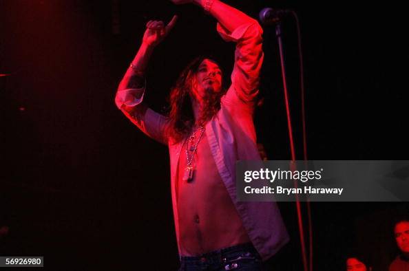 Cisco Alder, singer for rock group Whitestarr performs at the Babies