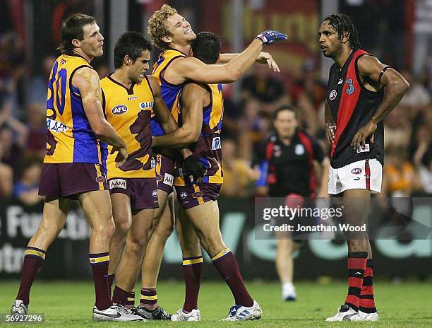 Jared Brennan of the Lions celebrates a goal during the first round NAB Cup match between the Brisbane Lions and Essendon at Carrara Stadium on...