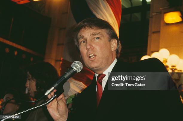 American real estate magnate Donald Trump speaking at an event, circa 1990.