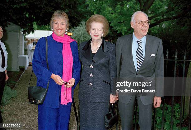 British journalist, Carol Thatcher with her mother, former Prime Minister, Margaret Thatcher and father, Denis Thatcher attending a garden party at...