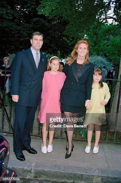 Prince Andrew, Duke of York, and Sarah, Duchess of York with their children, Princess Beatrice of York and Princess Eugenie of York, attending a...