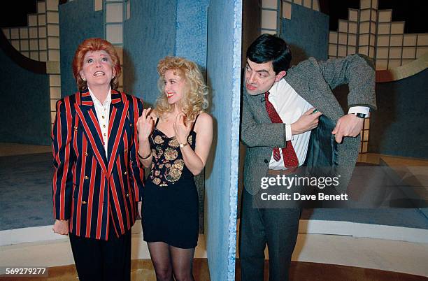 English singer and television presenter Cilla Black and Rowan Atkinson during the 'Blind Date' television show for the Comic Relief charity telethon,...
