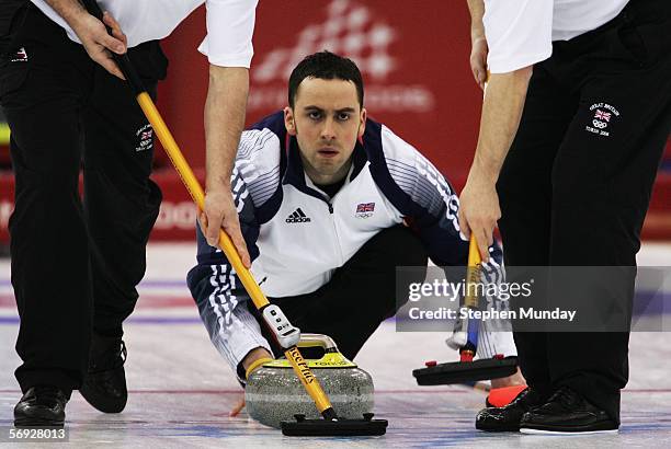 David Murdoch of Great Britain releases a stone during the Gold medal match of the men's curling between United States and Great Britain during Day...