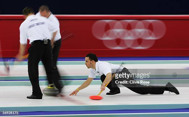 David Murdoch of Great Britain releases a stone during the Gold medal match of the men's curling between United States and Great Britain during Day...