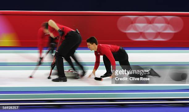 Pete Fenson of United States releases the stone during the bronze medal match of the men's curling between United States and Great Britain during Day...