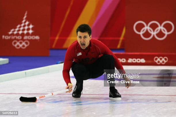 Pete Fenson of United States shouts instructions during the bronze medal match of the men's curling between United States and Great Britain during...