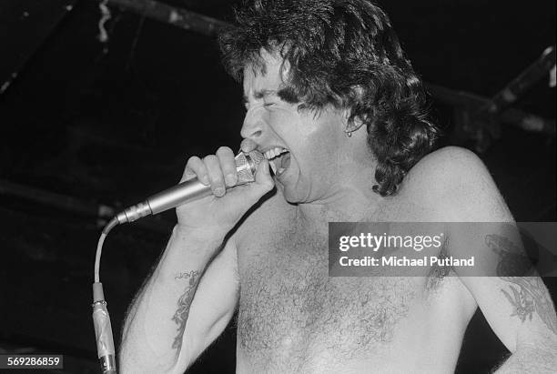 Singer Bon Scott performing with hard rock group AC/DC at the Marquee Club, London, 12th May 1976.