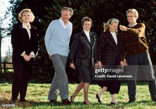 Michael Heseltine strolls with his family in the grounds of his home in Thenford, Northamptonshire, England on November 18, 1990. Heseltine was in...