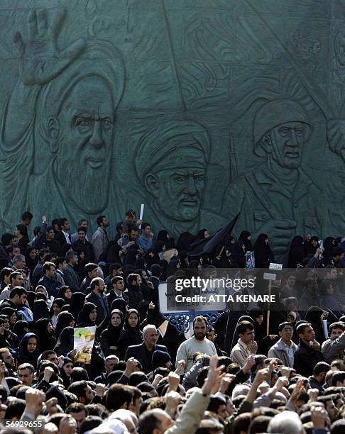 Iranians march after the Friday prayer to condemn the bombing of the 1,000-year-old Imam Ali al-Hadi mausoleum in Samarra in Iraq, 24 February 2006...