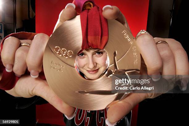 Russian figure skater Irina Slutskaya poses for a photo after appearing on NBC's Today Show during the Turin 2006 Winter Olympic Games February 24,...