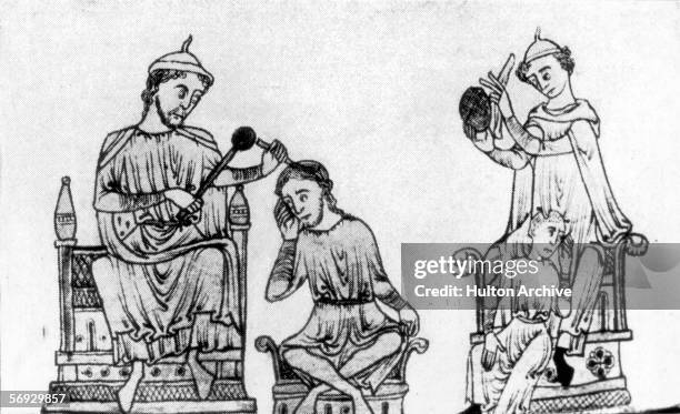 Medieval surgeon performs a trepanning operation on a patient's skull, circa 1350. An illustration from Social England Vol II, p.119.