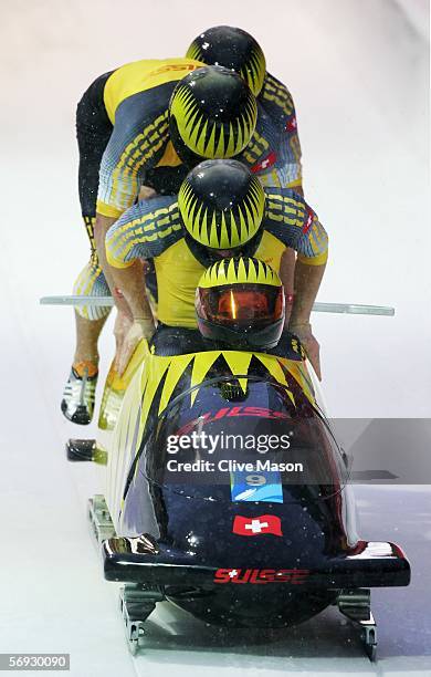 Pilot Martin Annen, Thomas Lamparter, Beat Hefti and Cedric Grand of Switzerland 1 compete in the Four Man Bobsleigh event on Day 14 of the 2006...