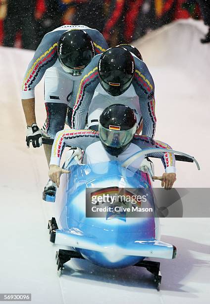 Pilot Andre Lange, Rene Hoppe, Kevin Kuske and Martin Putze of Germany 1 compete in the Four Man Bobsleigh event on Day 14 of the 2006 Turin Winter...