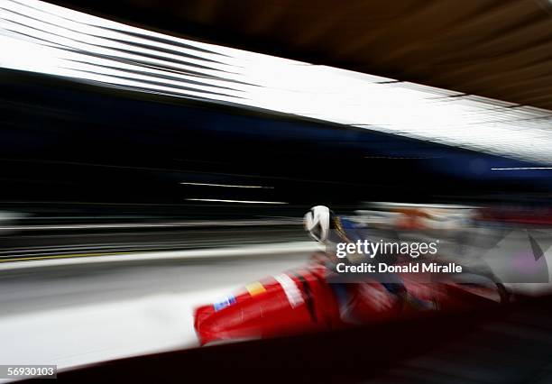 Nicolae Istrate, Adrian Duminicel, Gabriel Popa and Ioan Danut Dovalciuc of Romania 1 compete in the Four Man Bobsleigh event on Day 14 of the 2006...