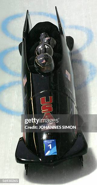 Of Todd Hays speeds down the track during the first run of the four-man bobsleigh event at the Turin 2006 Winter Olympics in Cesana Pariol, 24...