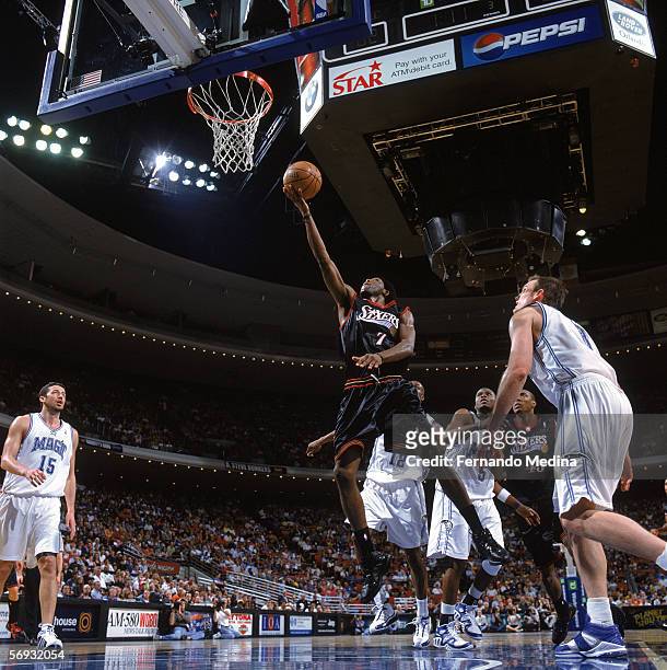 John Salmons of the Philadelphia 76ers goes for a layup during a game against the Orlando Magic at TD Waterhouse Centre on January 29, 2006 in...