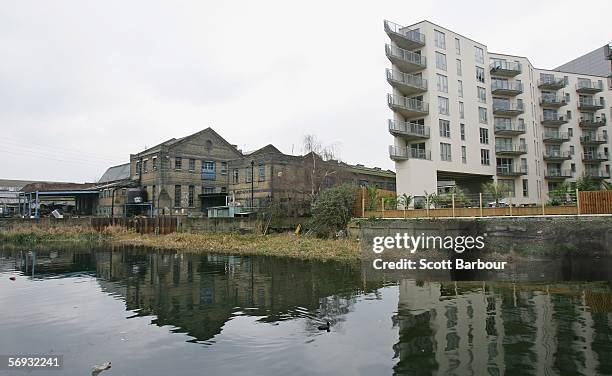 New block of flats is shown located next to derelict buildings alongside of the River Lea near the site of the London 2012 Olympics in the East...