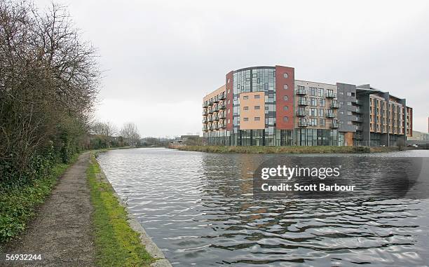 New building sits on the River Lea where other building sit abandoned near the site of the London 2012 Olympics in the East London borough of...