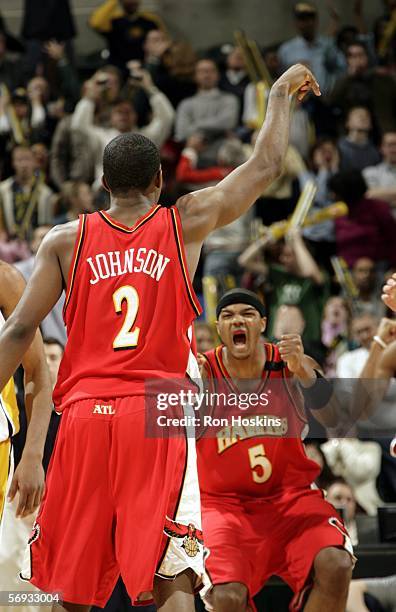 Josh Smith of the Atlanta Hawks reacts after Joe Johnson of the Hawks hits a three to take their game with the Indiana Pacers into overtime on...