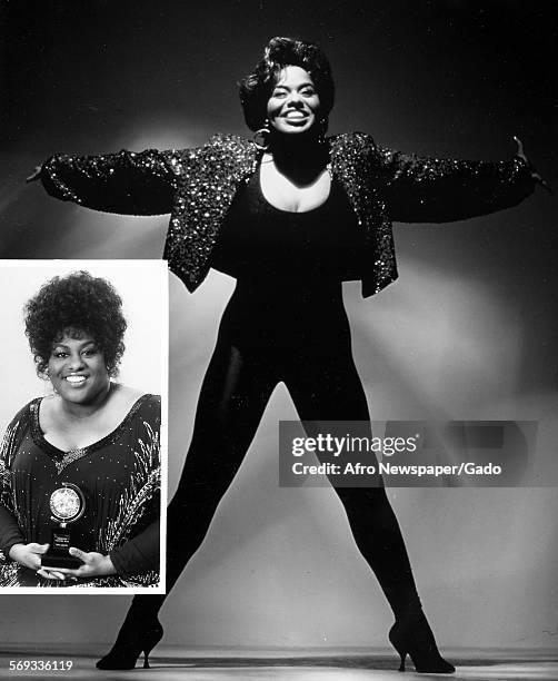 American soul singer and performing artist Jennifer Holliday on stage and collecting an award, December 17, 1997.