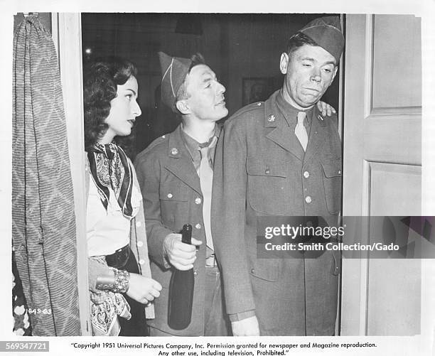 Marina Berti, David Wayne, and Tom Ewell star in the film Up Front, 1951.