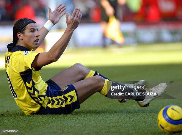 London, UNITED KINGDOM: Aston Villa's Milan Baros appeals to the referee during their Premiership match against Charlton Athletic at home to Charlton...