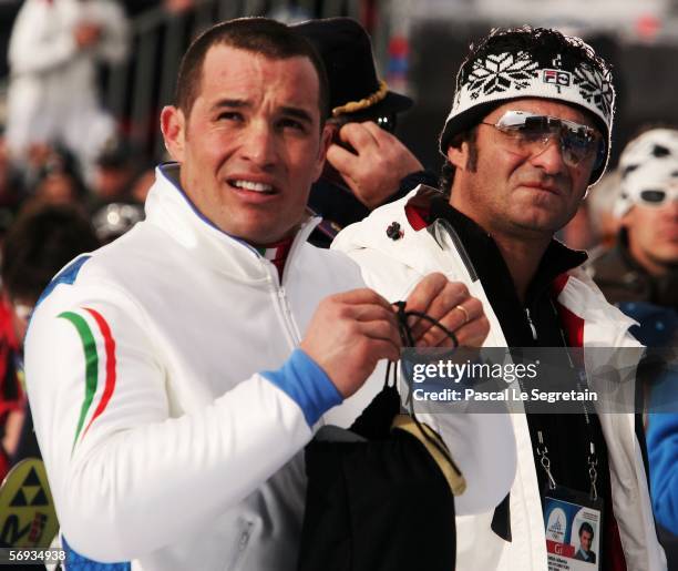 Giorgio Rocca of Italy is pictured with Alberto Tomba in the Final of the Mens Alpine Skiing Slalom on Day 15 of the 2006 Turin Winter Olympic Games...