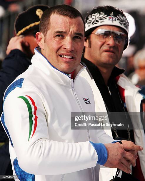 Giorgio Rocca of Italy is pictured with Alberto Tomba in the Final of the Mens Alpine Skiing Slalom on Day 15 of the 2006 Turin Winter Olympic Games...