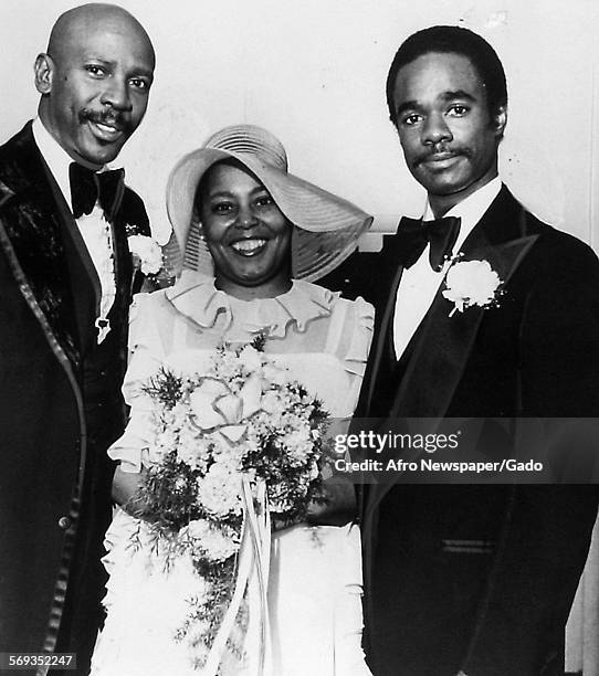 Actors Louis Gossett Jr. And Glynn Turman pose for a portrait with bridesmaid Atlantic Records VP Noreen Woods at the wedding of Turman and singer...