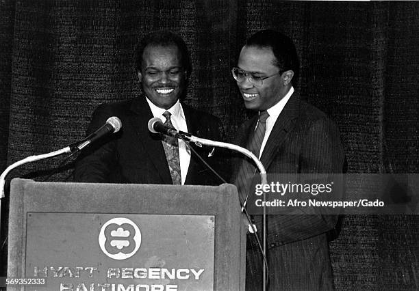 Standing with Dave Scott, Kurt Schmoke giving a speech at the Hyatt Regency, Baltimore, Maryland, 1987.