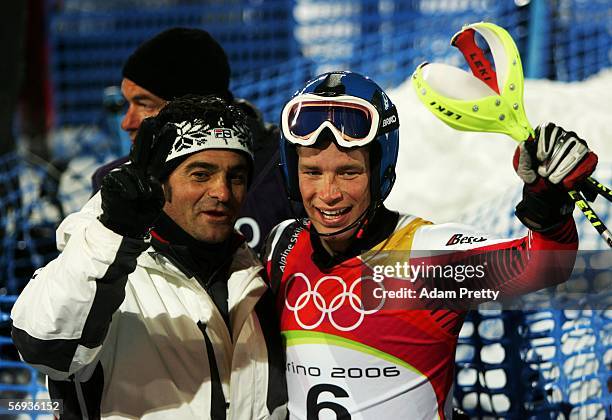 Benjamin Raich of Austria celebrates with Alberto Tomba in the Final of the Mens Alpine Skiing Slalom on Day 15 of the 2006 Turin Winter Olympic...